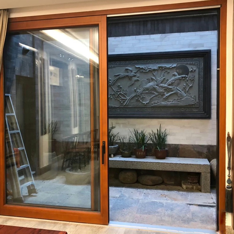 嚴嚴冬日里選擇保暖的鋁木復合門窗有多重要？